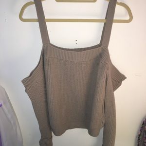 Long sleeve open shoulder sweater. NWOT